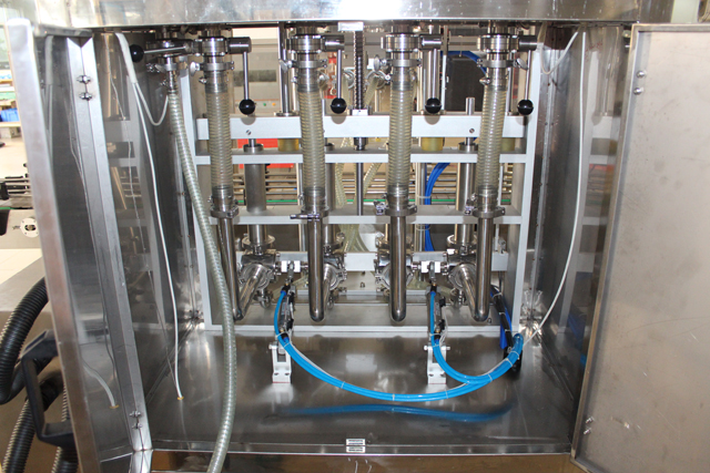 UZPILDĪŠANAS MAŠĪNA 4 galviņas (2).JPG