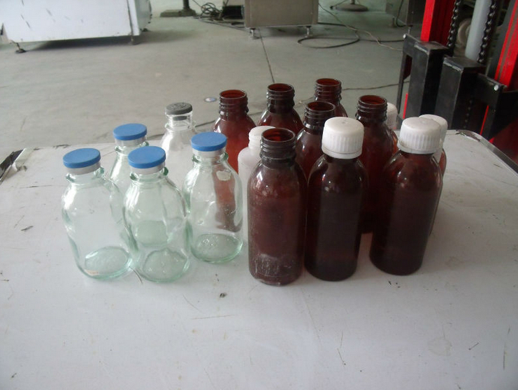 powder filling capping machines pudeles pildīšanai aizvākošanas mašīna.jpg