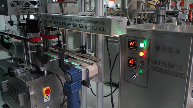 aluminum induction foil sealing machine aizzīmogošanas mašīna automātiska.jpg