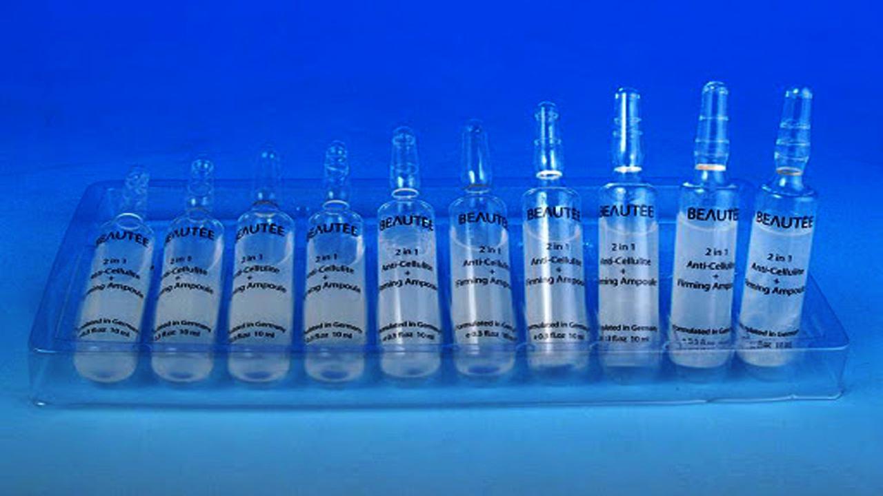 liquid solution bottles labeling machine samples final products ampulu pudeles.jpg
