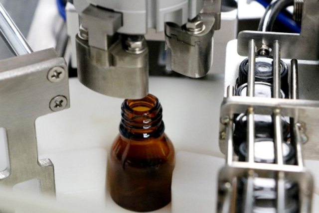 eļļas pudeļu pildīšanas mašīna tabletop.jpg