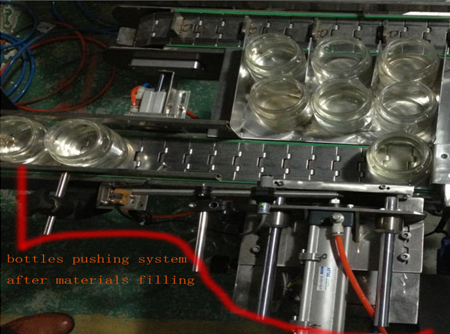 automatic bottles pushing system after filing pudeļu stumšanas sistēma.jpg